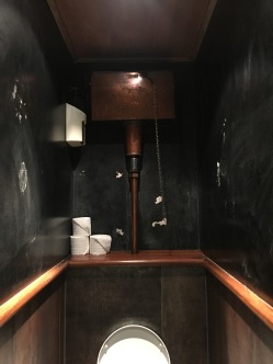 old fashion toilet in The Cow Restaurant